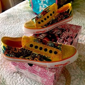 This is a pair of size 9 Ed Hardy slip on sneakers. Only worn a couple of times
